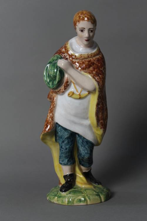 Standing shepherd. Large, coloured figure.